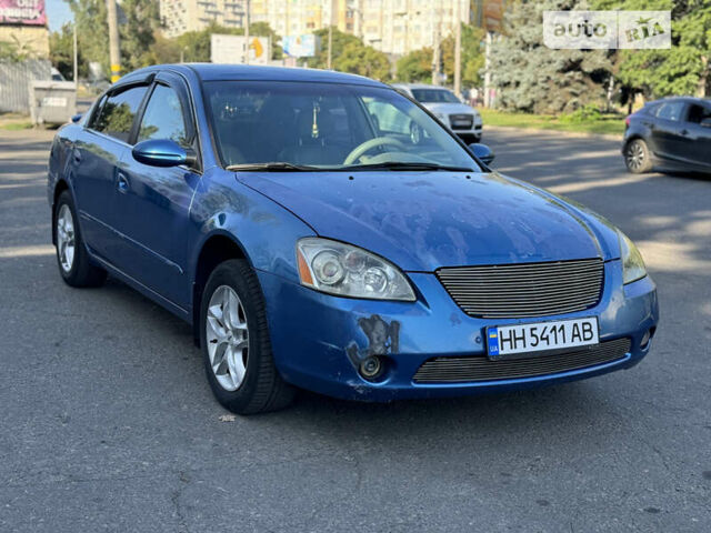 Синій Ніссан Альтіма, об'ємом двигуна 2.49 л та пробігом 160 тис. км за 2999 $, фото 1 на Automoto.ua