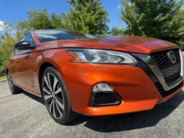 Помаранчевий Ніссан Альтіма, об'ємом двигуна 2.5 л та пробігом 40 тис. км за 8000 $, фото 1 на Automoto.ua