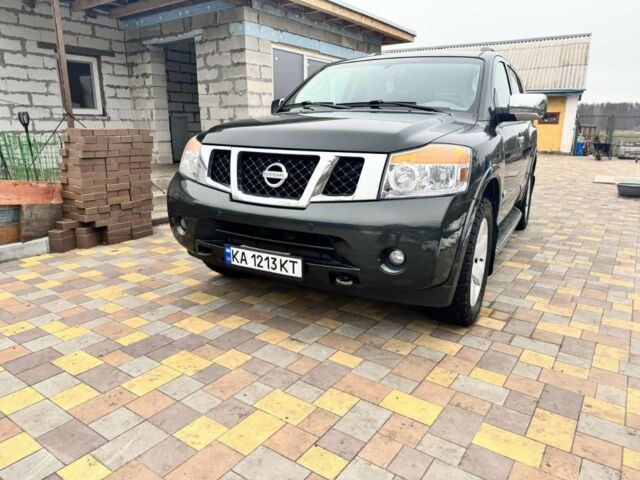 Черный Ниссан Армада, объемом двигателя 5.6 л и пробегом 150 тыс. км за 12800 $, фото 1 на Automoto.ua
