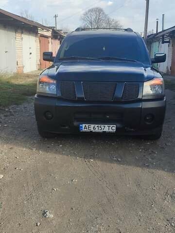 Черный Ниссан Армада, объемом двигателя 5.6 л и пробегом 300 тыс. км за 8500 $, фото 1 на Automoto.ua