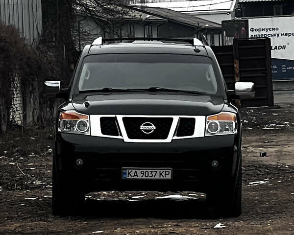 Черный Ниссан Армада, объемом двигателя 5.55 л и пробегом 180 тыс. км за 19500 $, фото 1 на Automoto.ua