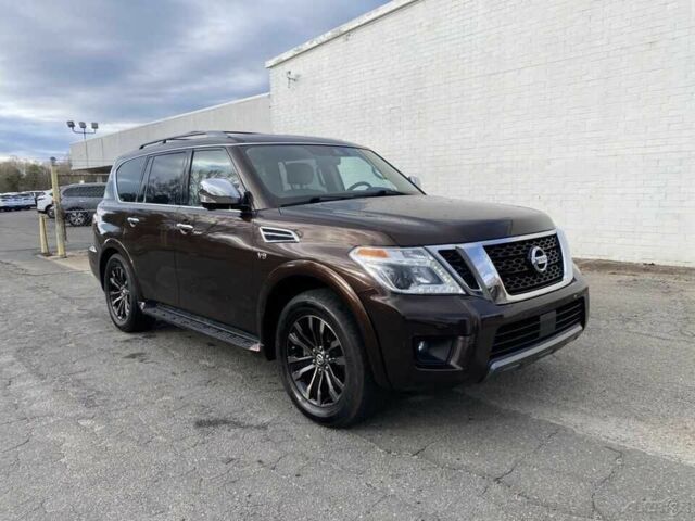 Коричневый Ниссан Армада, объемом двигателя 5.6 л и пробегом 49 тыс. км за 13200 $, фото 1 на Automoto.ua