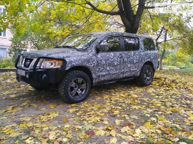 Сірий Ніссан Armada, об'ємом двигуна 5.6 л та пробігом 345 тис. км за 18000 $, фото 1 на Automoto.ua