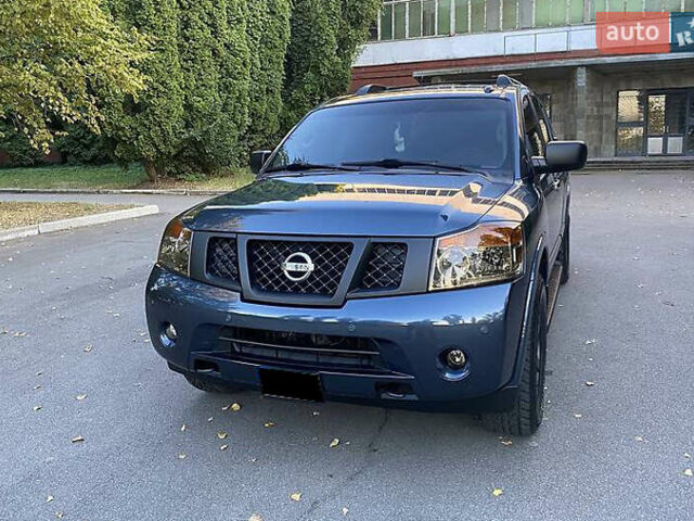 Синій Ніссан Armada, об'ємом двигуна 5.55 л та пробігом 126 тис. км за 15000 $, фото 1 на Automoto.ua