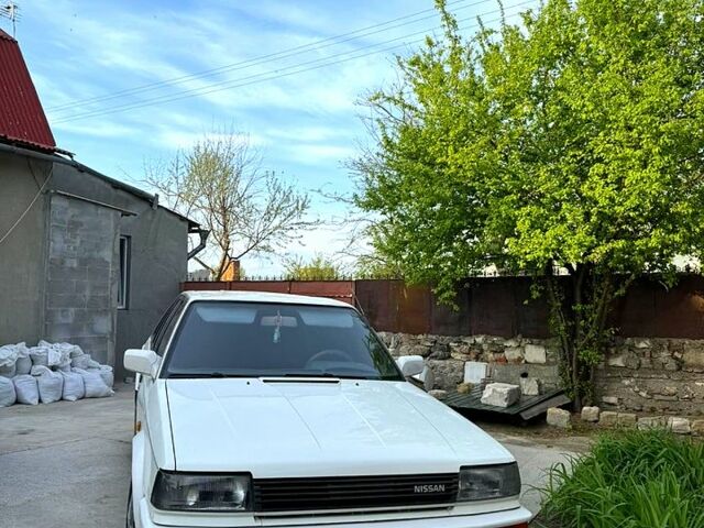 Белый Ниссан Блюберд, объемом двигателя 2 л и пробегом 230 тыс. км за 1800 $, фото 1 на Automoto.ua