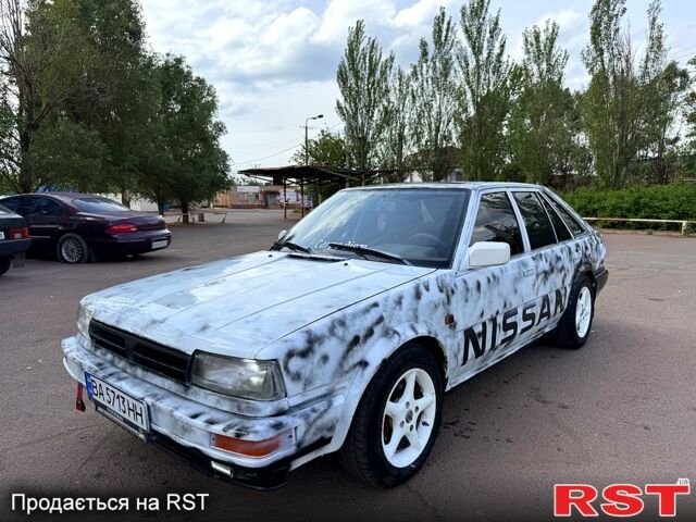 Белый Ниссан Блюберд, объемом двигателя 2 л и пробегом 200 тыс. км за 1050 $, фото 1 на Automoto.ua