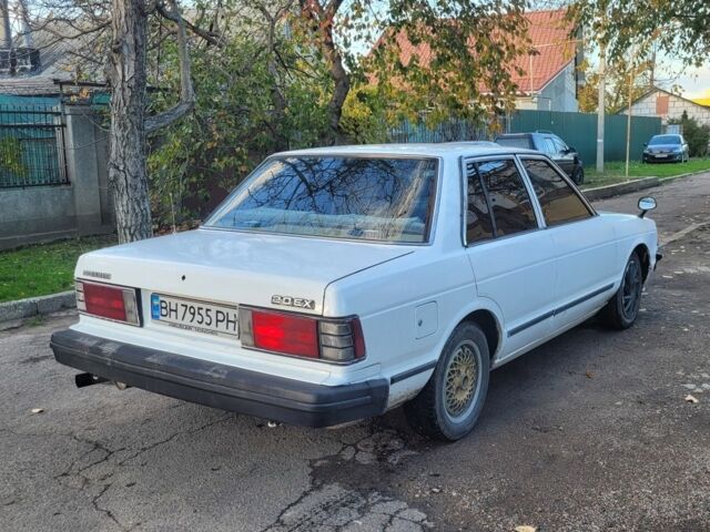 Белый Ниссан Блюберд, объемом двигателя 2 л и пробегом 300 тыс. км за 650 $, фото 1 на Automoto.ua