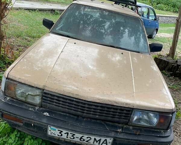 Желтый Ниссан Блюберд, объемом двигателя 2 л и пробегом 130 тыс. км за 900 $, фото 1 на Automoto.ua