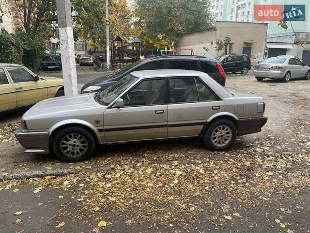 Серый Ниссан Блюберд, объемом двигателя 2 л и пробегом 250 тыс. км за 1600 $, фото 1 на Automoto.ua