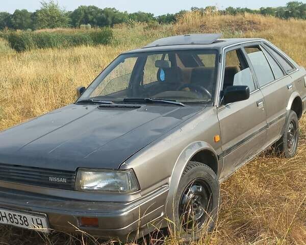 Серый Ниссан Блюберд, объемом двигателя 2 л и пробегом 347 тыс. км за 800 $, фото 1 на Automoto.ua