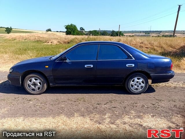 Синий Ниссан Блюберд, объемом двигателя 2 л и пробегом 374 тыс. км за 1600 $, фото 1 на Automoto.ua
