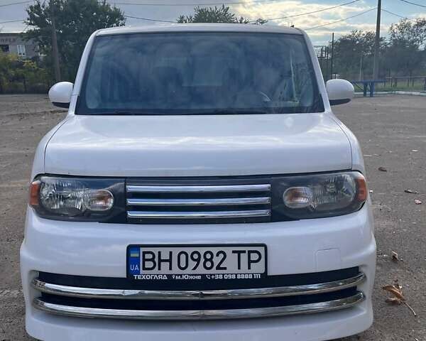 Белый Ниссан Куб, объемом двигателя 1.8 л и пробегом 180 тыс. км за 5700 $, фото 1 на Automoto.ua