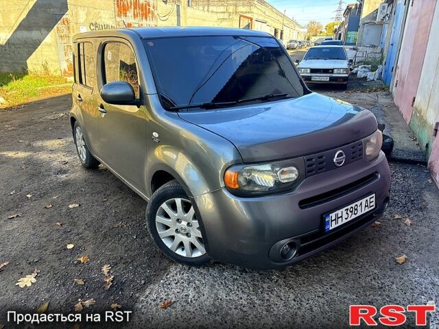 Серый Ниссан Куб, объемом двигателя 1.8 л и пробегом 300 тыс. км за 4700 $, фото 1 на Automoto.ua