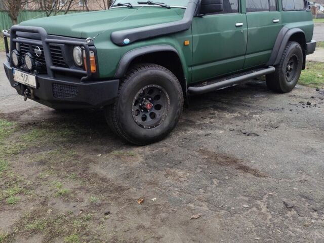 Зеленый Ниссан Другая, объемом двигателя 4 л и пробегом 300 тыс. км за 14500 $, фото 1 на Automoto.ua