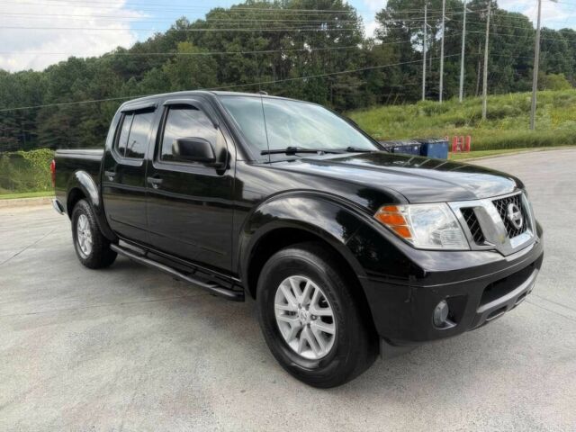 Черный Ниссан Фронтиер, объемом двигателя 4 л и пробегом 50 тыс. км за 25000 $, фото 1 на Automoto.ua