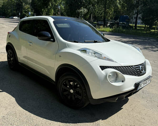 Белый Ниссан Жук, объемом двигателя 1.6 л и пробегом 217 тыс. км за 9600 $, фото 1 на Automoto.ua