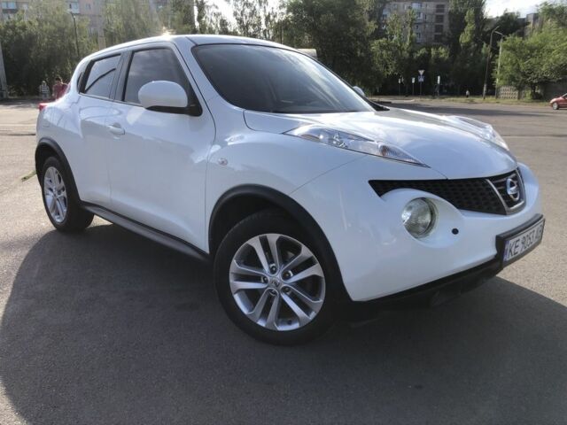 Белый Ниссан Жук, объемом двигателя 1.6 л и пробегом 112 тыс. км за 10000 $, фото 1 на Automoto.ua