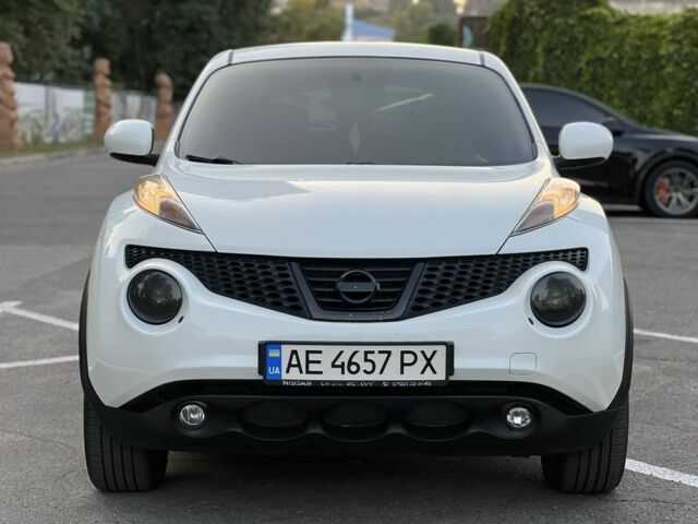 Белый Ниссан Жук, объемом двигателя 1.6 л и пробегом 150 тыс. км за 12237 $, фото 1 на Automoto.ua