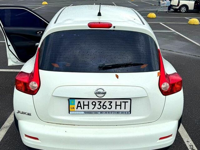 Белый Ниссан Жук, объемом двигателя 1.6 л и пробегом 53 тыс. км за 13000 $, фото 1 на Automoto.ua
