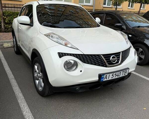 Белый Ниссан Жук, объемом двигателя 1.6 л и пробегом 175 тыс. км за 9500 $, фото 1 на Automoto.ua