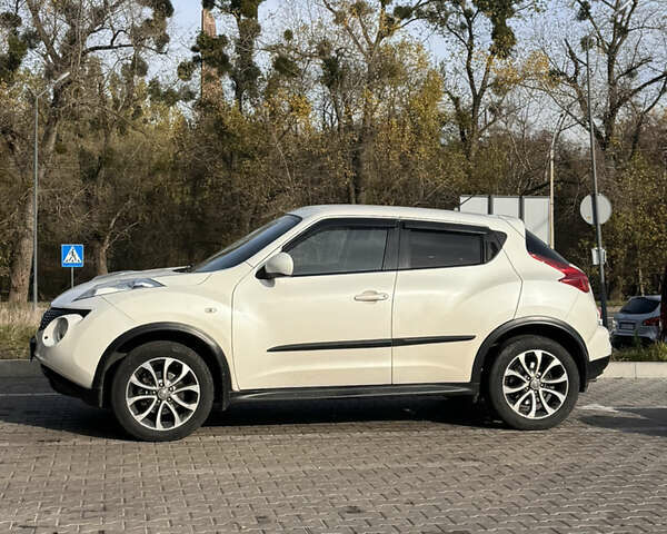 Белый Ниссан Жук, объемом двигателя 1.6 л и пробегом 158 тыс. км за 10500 $, фото 1 на Automoto.ua