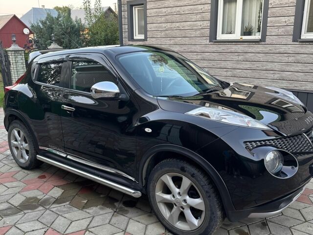 Черный Ниссан Жук, объемом двигателя 1.6 л и пробегом 161 тыс. км за 10200 $, фото 1 на Automoto.ua