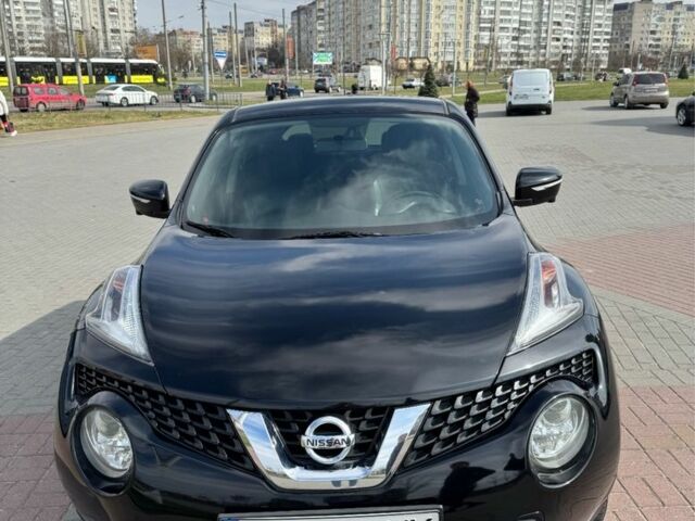 Черный Ниссан Жук, объемом двигателя 1.6 л и пробегом 65 тыс. км за 12000 $, фото 1 на Automoto.ua