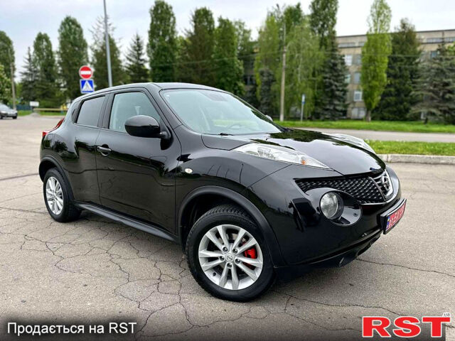 Черный Ниссан Жук, объемом двигателя 1.6 л и пробегом 200 тыс. км за 8750 $, фото 1 на Automoto.ua