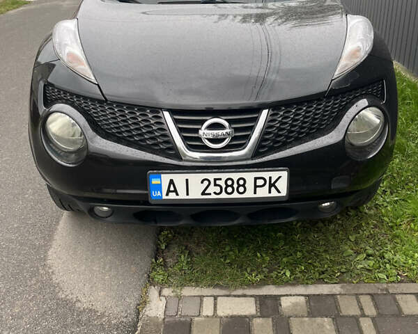 Черный Ниссан Жук, объемом двигателя 1.46 л и пробегом 212 тыс. км за 7800 $, фото 1 на Automoto.ua