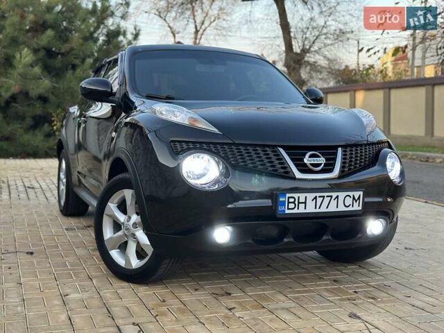 Черный Ниссан Жук, объемом двигателя 1.6 л и пробегом 117 тыс. км за 9900 $, фото 1 на Automoto.ua