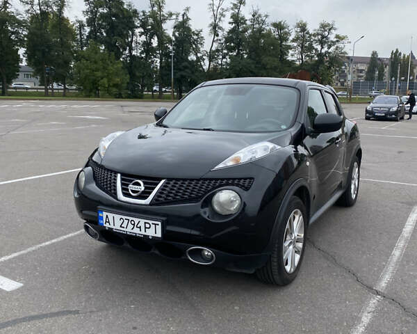 Черный Ниссан Жук, объемом двигателя 1.6 л и пробегом 120 тыс. км за 8300 $, фото 1 на Automoto.ua