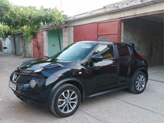 Черный Ниссан Жук, объемом двигателя 1.6 л и пробегом 160 тыс. км за 9150 $, фото 1 на Automoto.ua