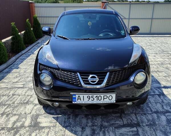 Чорний Ніссан Жук, об'ємом двигуна 1.62 л та пробігом 124 тис. км за 10000 $, фото 1 на Automoto.ua