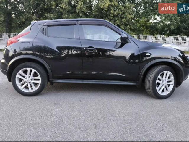 Черный Ниссан Жук, объемом двигателя 1.6 л и пробегом 153 тыс. км за 9500 $, фото 1 на Automoto.ua