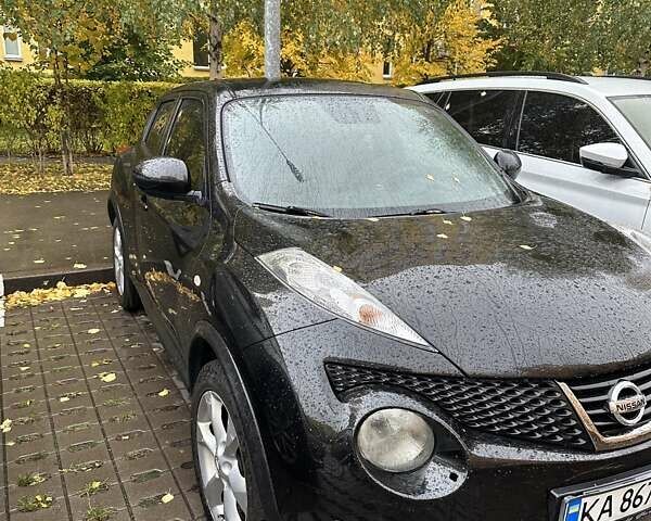 Черный Ниссан Жук, объемом двигателя 1.6 л и пробегом 103 тыс. км за 9700 $, фото 1 на Automoto.ua