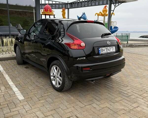 Черный Ниссан Жук, объемом двигателя 1.6 л и пробегом 115 тыс. км за 11000 $, фото 1 на Automoto.ua