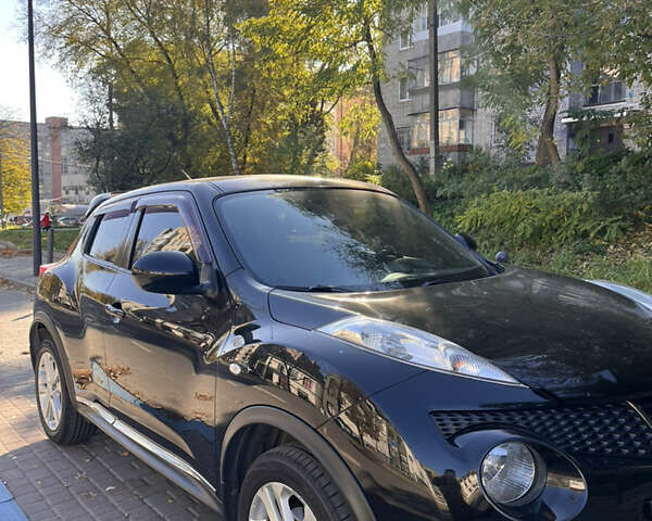 Чорний Ніссан Жук, об'ємом двигуна 1.6 л та пробігом 98 тис. км за 10500 $, фото 1 на Automoto.ua