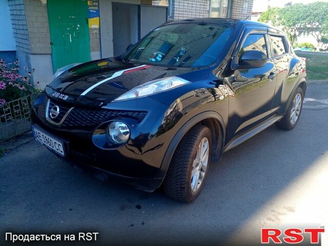 Черный Ниссан Жук, объемом двигателя 1.6 л и пробегом 211 тыс. км за 9500 $, фото 1 на Automoto.ua