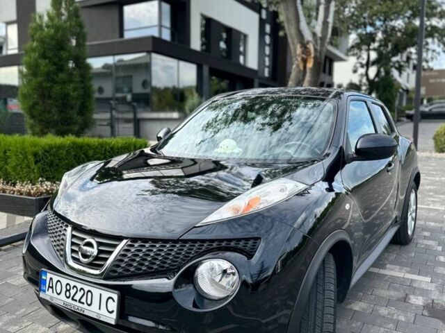 Черный Ниссан Жук, объемом двигателя 1.6 л и пробегом 184 тыс. км за 10500 $, фото 1 на Automoto.ua