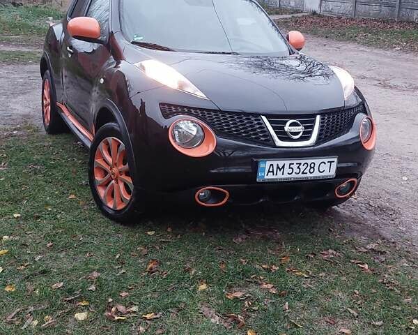 Черный Ниссан Жук, объемом двигателя 1.46 л и пробегом 146 тыс. км за 10700 $, фото 1 на Automoto.ua