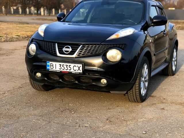 Черный Ниссан Жук, объемом двигателя 1.6 л и пробегом 154 тыс. км за 12300 $, фото 1 на Automoto.ua