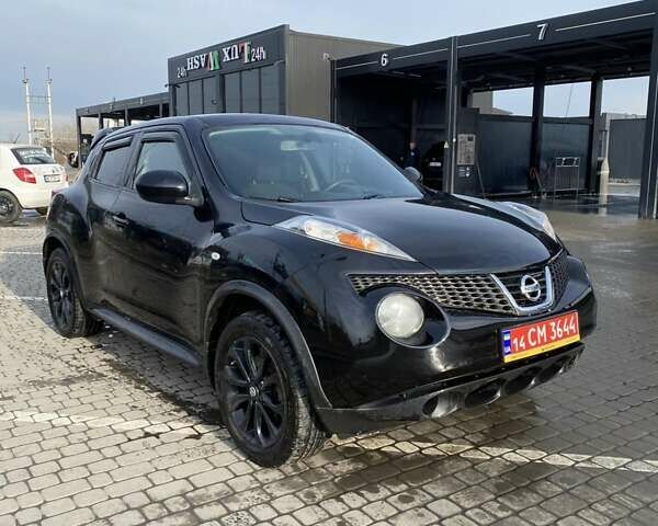 Черный Ниссан Жук, объемом двигателя 1.6 л и пробегом 188 тыс. км за 8699 $, фото 1 на Automoto.ua