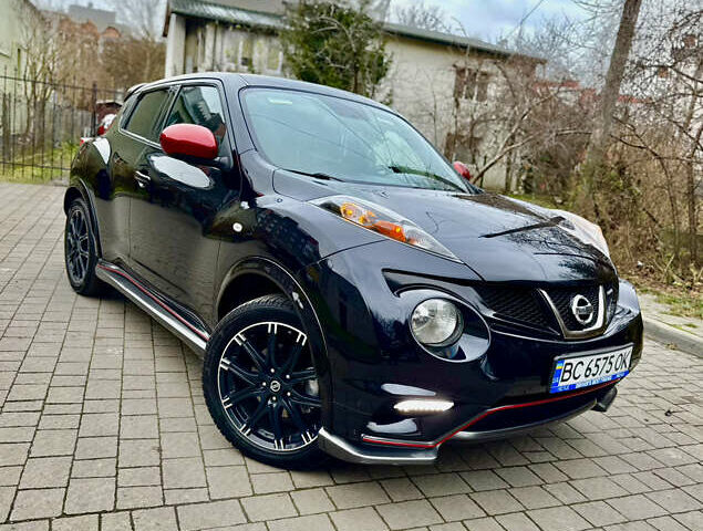 Черный Ниссан Жук, объемом двигателя 1.6 л и пробегом 133 тыс. км за 10750 $, фото 1 на Automoto.ua