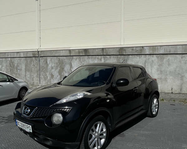 Черный Ниссан Жук, объемом двигателя 1.6 л и пробегом 103 тыс. км за 10700 $, фото 1 на Automoto.ua