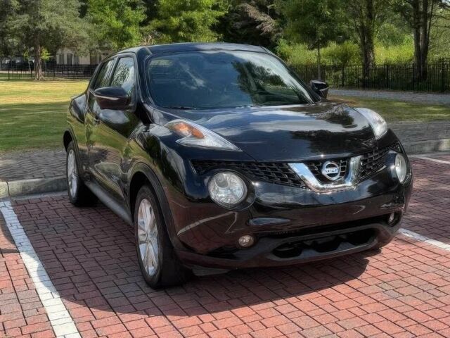 Черный Ниссан Жук, объемом двигателя 1.6 л и пробегом 73 тыс. км за 6500 $, фото 1 на Automoto.ua