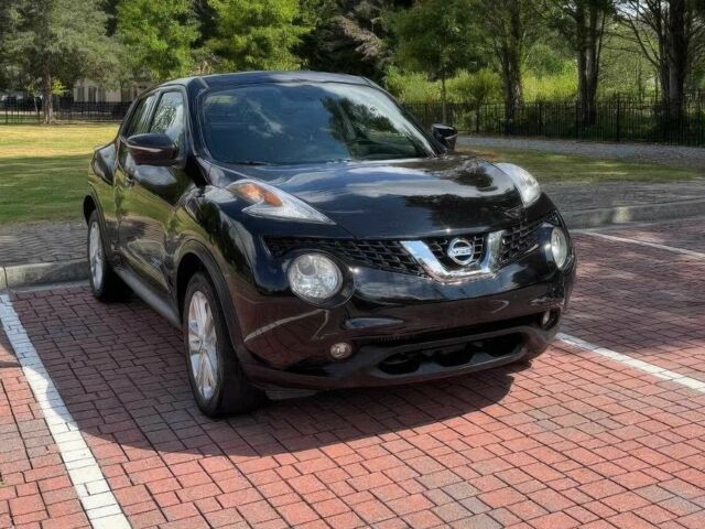 Черный Ниссан Жук, объемом двигателя 1.6 л и пробегом 76 тыс. км за 9600 $, фото 1 на Automoto.ua