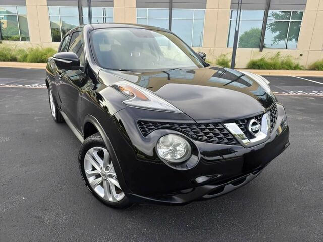 Черный Ниссан Жук, объемом двигателя 1.6 л и пробегом 70 тыс. км за 10000 $, фото 1 на Automoto.ua