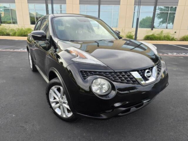 Черный Ниссан Жук, объемом двигателя 1.6 л и пробегом 75 тыс. км за 3900 $, фото 1 на Automoto.ua