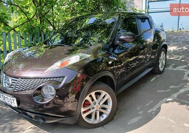 Фіолетовий Ніссан Жук, об'ємом двигуна 1.6 л та пробігом 109 тис. км за 9555 $, фото 1 на Automoto.ua