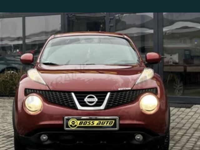 Червоний Ніссан Жук, об'ємом двигуна 1.6 л та пробігом 200 тис. км за 10000 $, фото 1 на Automoto.ua